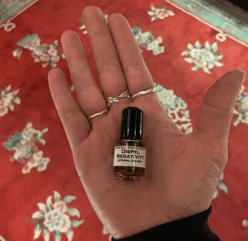 A Tiny Dispel Negativity Oil Bottle
