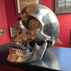 Anatomical skull with moveable jaw cast from brass