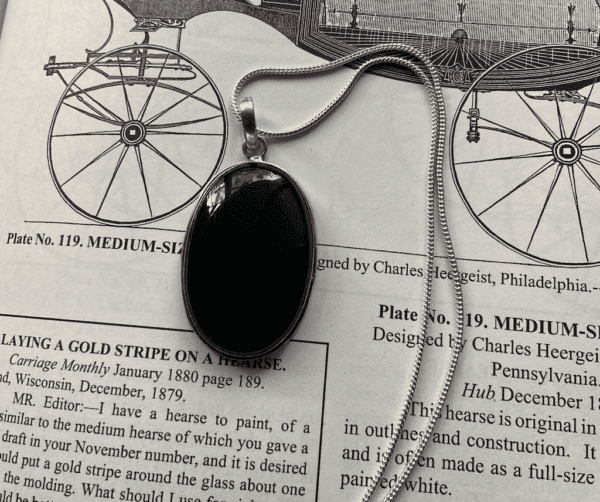 Beautiful Obsidian stone strung on a sterling silver chain